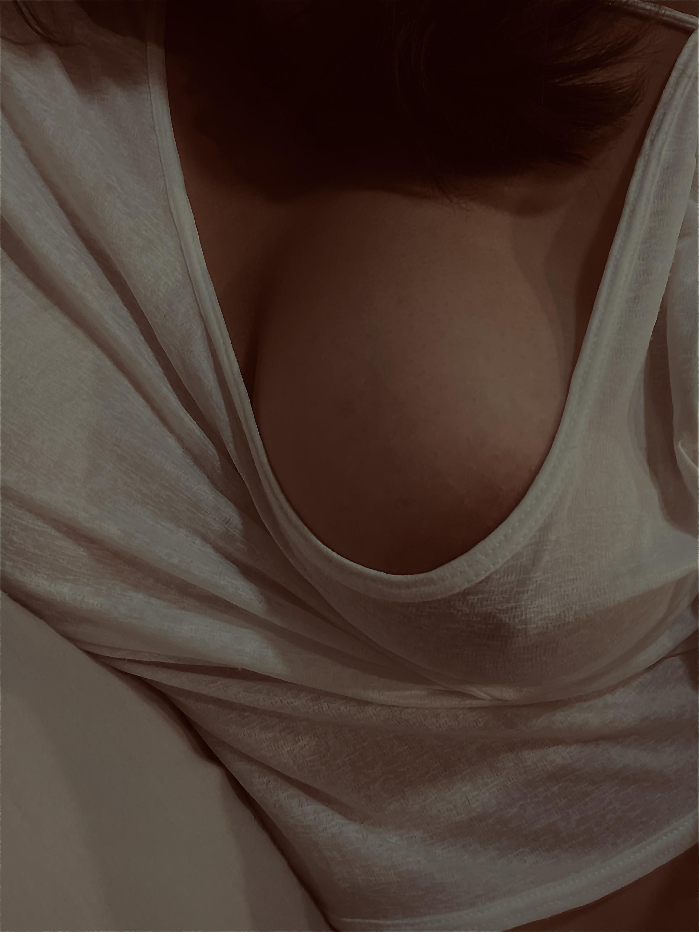  : You can still see the big breasts looming through the clothes